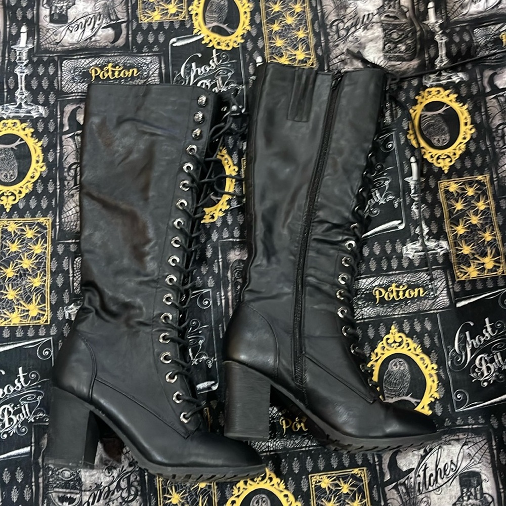 Tall lace up boots